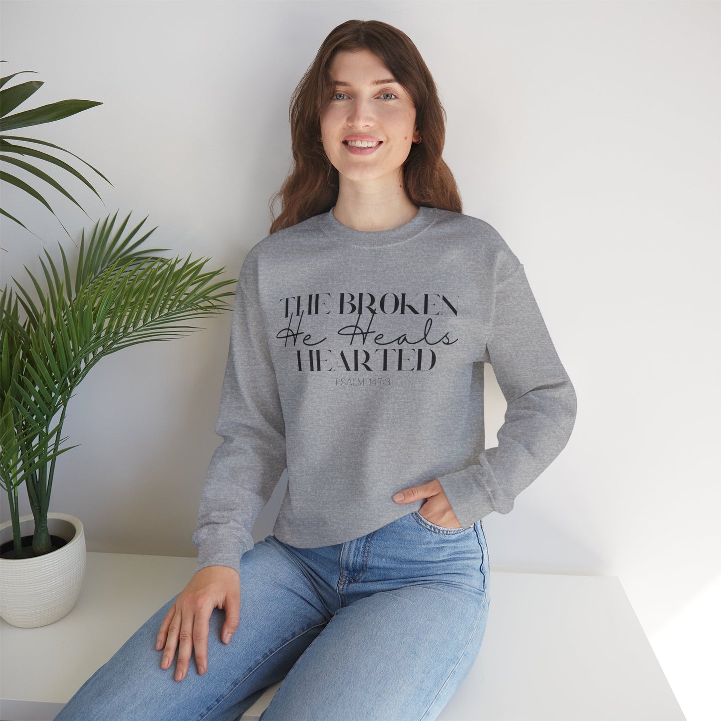 The Broken He heals Hearted Unisex Heavy Blend Crewneck Sweatshirt