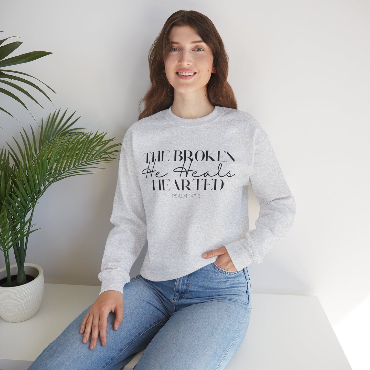 The Broken He heals Hearted Unisex Heavy Blend Crewneck Sweatshirt