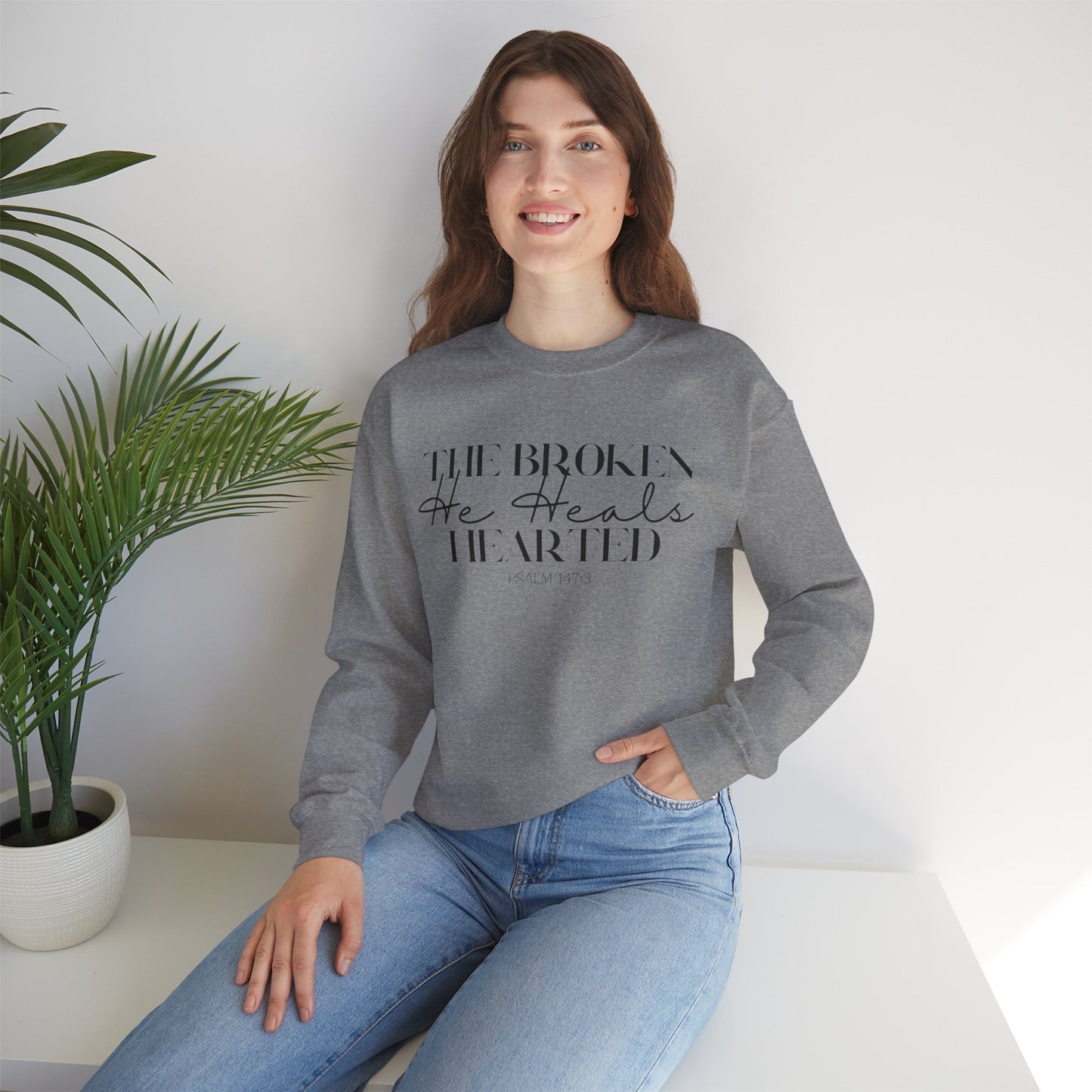 The Broken He heals Hearted Unisex Heavy Blend Crewneck Sweatshirt